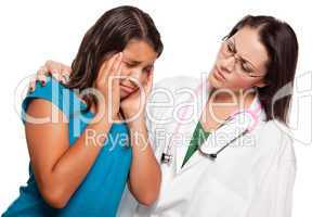 Unhappy Hispanic Girl and Concerned Female Doctor
