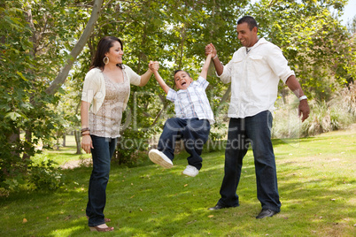 Young Family Having Fun in the Park
