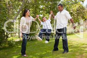 Young Family Having Fun in the Park