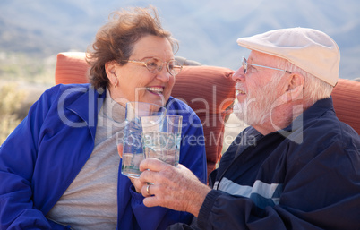 Happy Senior Adult Couple with Drinks