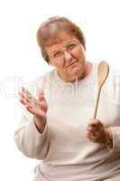 Upset Senior Woman with The Wooden Spoon