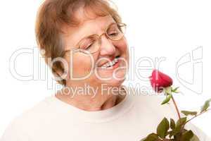 Attractive Senior Woman with Red Rose.