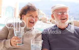 Happy Senior Adult Couple with Drinks
