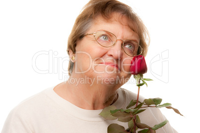 Attractive Senior Woman with Red Rose.