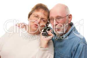 Happy Senior Couple Using Cell Phone