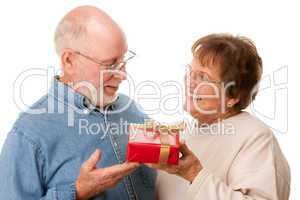 Happy Senior Couple with Gift