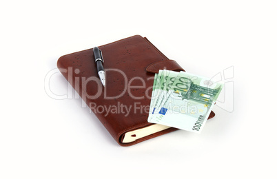personal organizer with pen and euros