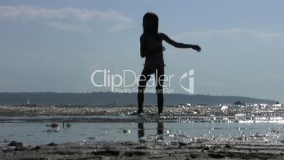 Little Girl Doing Twirls At The Beach