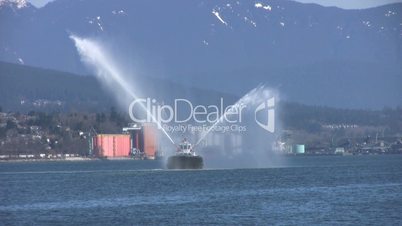 Tug Boat Spraying Water