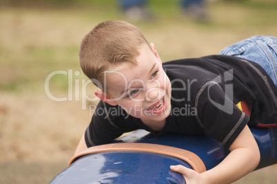 Adorable Child Playing at the Playground
