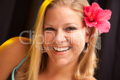 Beautiful Girl with Hibiscus in Her Hair