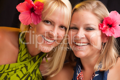 Beautiful Smiling Girls with Hibiscus Flower