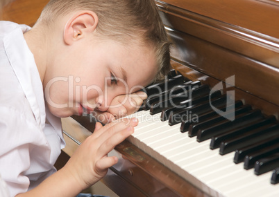 Young Boy Playing the Piano