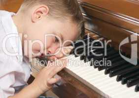 Young Boy Playing the Piano