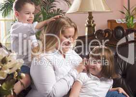 Mother and Children on The Couch