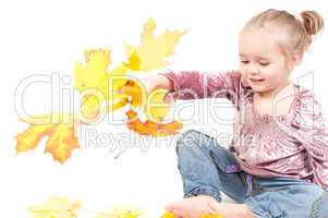 Toddler with maple leaves