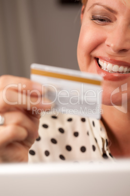 Beautiful Woman Using Laptop Holding Her Credit Card