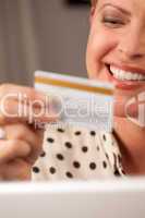 Beautiful Woman Using Laptop Holding Her Credit Card
