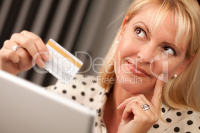 Beautiful Woman Using Laptop Holding Her Credit Card