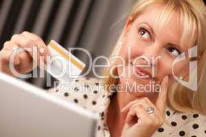 Beautiful Woman Using Laptop Holding Her Credit Card