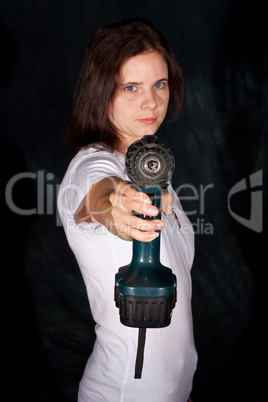 Frau mit Akkuschrauber