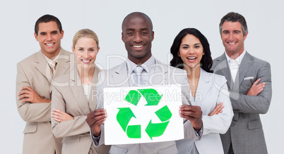 Business team holding a recycle symbol