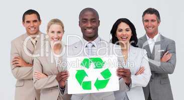 Business team holding a recycle symbol