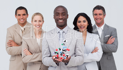 Business team holding a molecule model. Scince and business conc