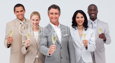 Business team celebrating a success with champagne