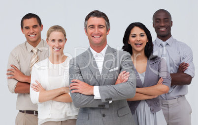 Smiling business team standing against white background