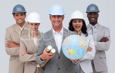 Enginner team holding a terrestrial globe