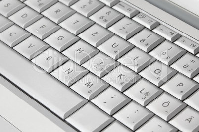 Modern laptop keyboard, closeup