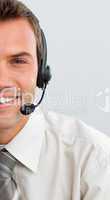 Attractive businessman with a headset on