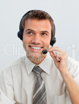 Young businessman working in a call center