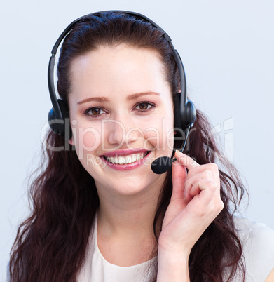 Portrait of smiling beautiful woman with a headset on