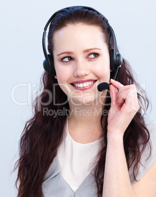 Brunette woman working in a call center