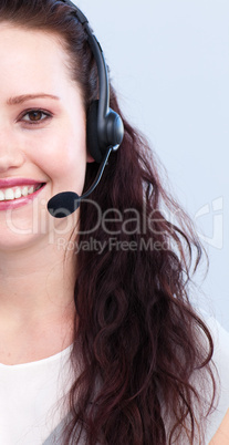 Smiling woman working with a headset on