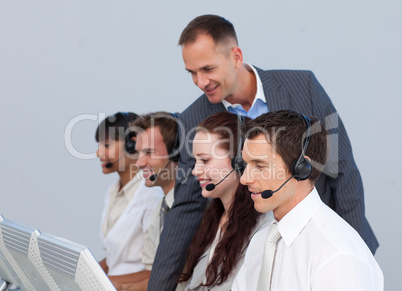 Manager and team working in a call center