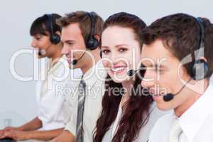 Woman working with more people in a call center