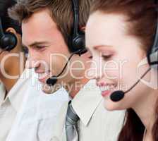 Portrait of people with a headset on in a call center