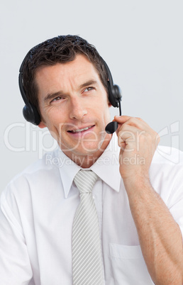 Mature businessman working in a call center