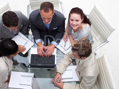 High angle of businesswoman working with his colleagues