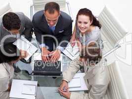 High angle of businesswoman working with his colleagues
