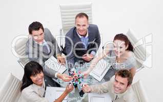 High angle of smiling business team holding molecules
