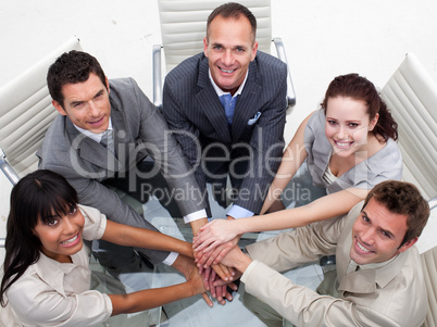 High angle of business team with hands together