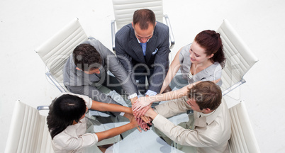 High angle of business people with hands together