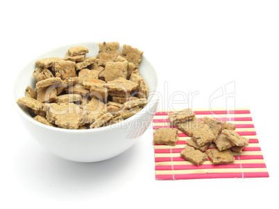 Selfmade dog cookies in a bowl of chinaware