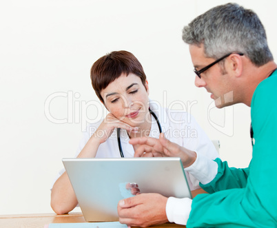 Doctor and surgeon at a meeting