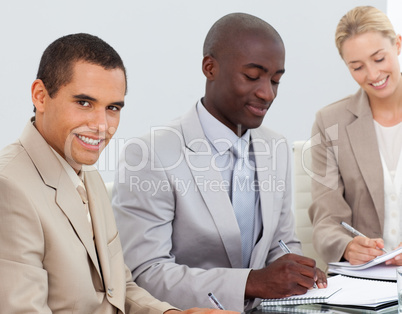 Business People Smiling in a meeting