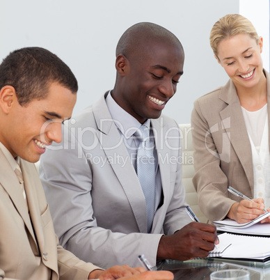 Business People Smiling in a meeting